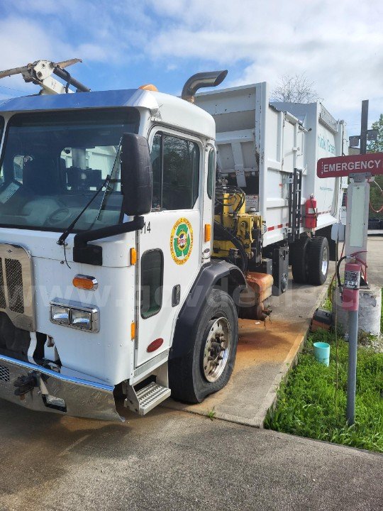 (2) 2015 CNG Peterbilt/EZ Pack  320 Garbage Trucks 