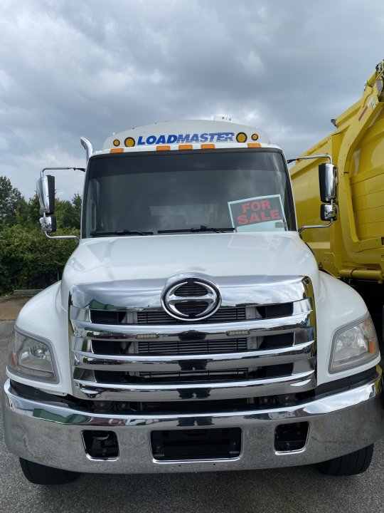 2017 Hino 338 with 20yd Loadmaster Rear Compaction System.