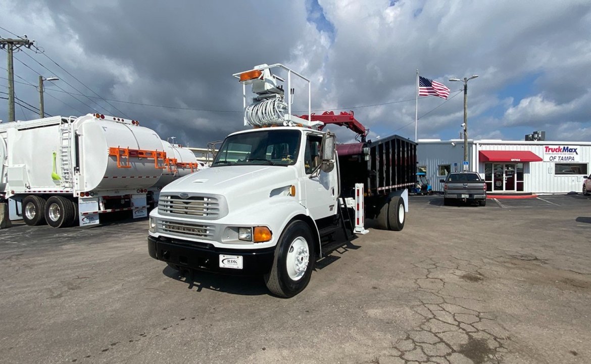 2007 Sterling ACTERRA - 28 yd Petersen Grapple Truck