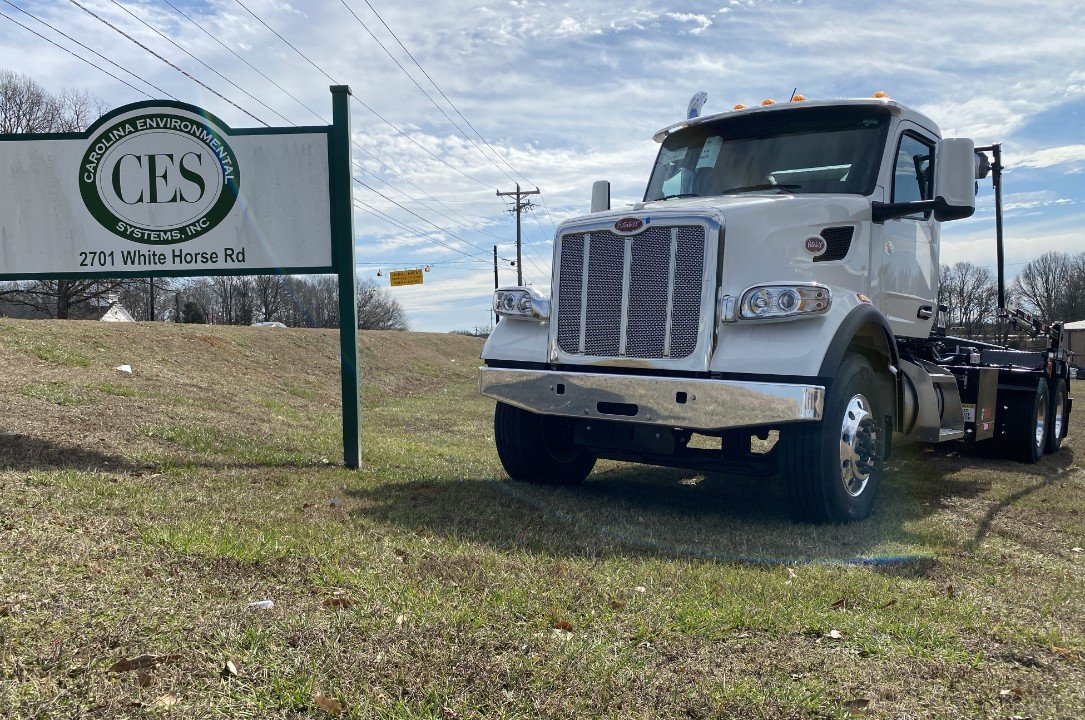 NEW - 2024 Peterbilt 567 Roll Off With 60K Galfab and Pioneer Tarper