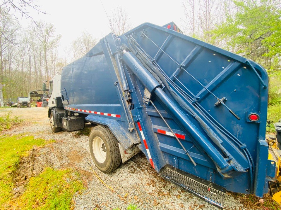 Used Peterbilt 220 with New Way 20yd RL Body