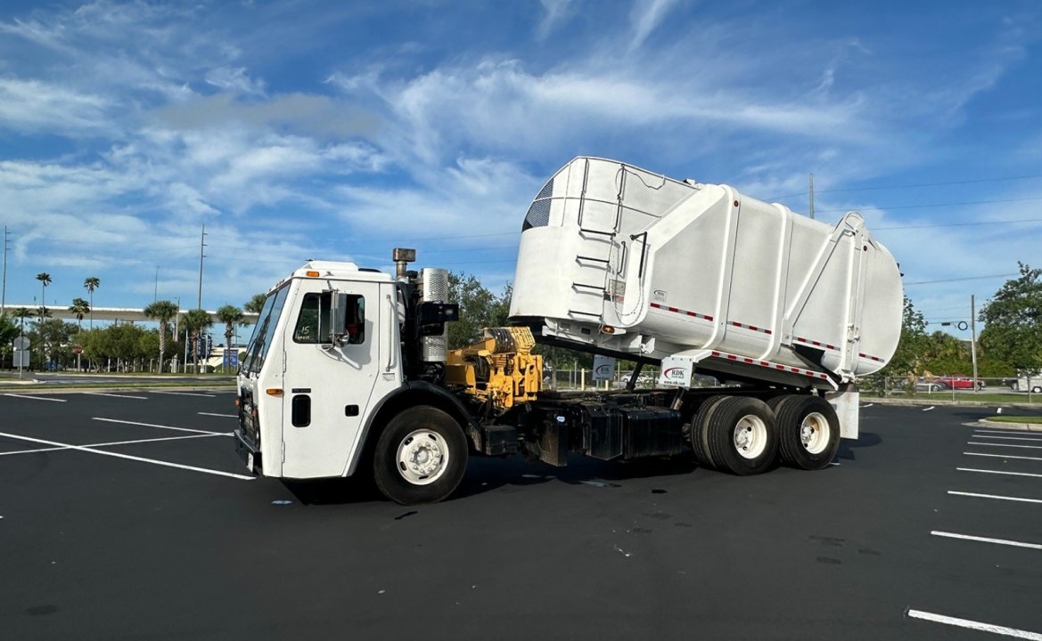 2012 Mack LEU613 - 30 yd. Heil Side Loader Garbage Truck