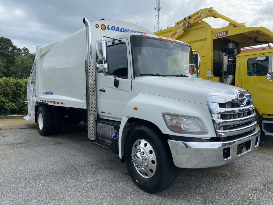 2017 Hino 338 with 20yd Loadmaster Rear Compaction System.