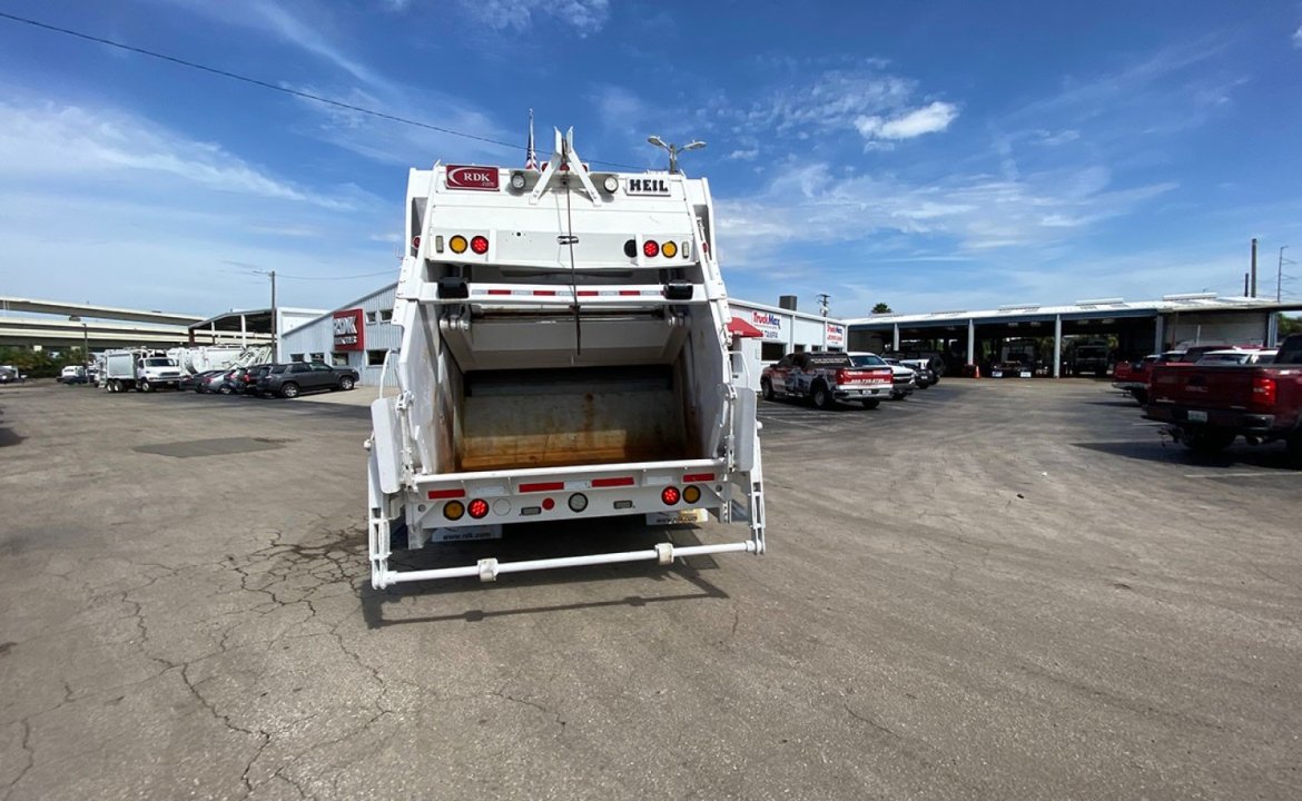 2017 Peterbilt 320 - 32 Yard heil Dura Pack 5000 Rear Loader Garbage Truck