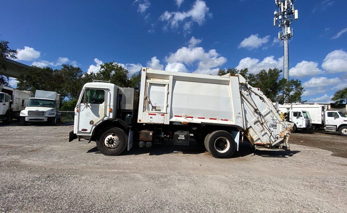 2014 Peterbilt 320 - 20 Yard Heil Rear Loader Garbage Truck