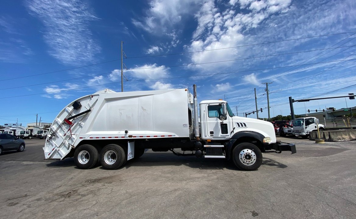 2010 Mack GU813 - 25 yd. McNeilus Rear Loader Garbage Truck