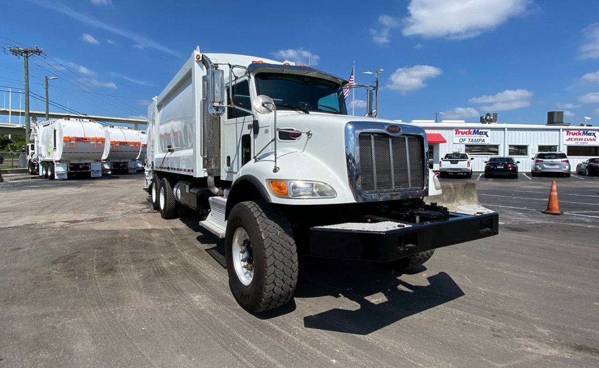 2016 Peterbilt 348 - 27 yard Heil Rear Loader Garbage Truck