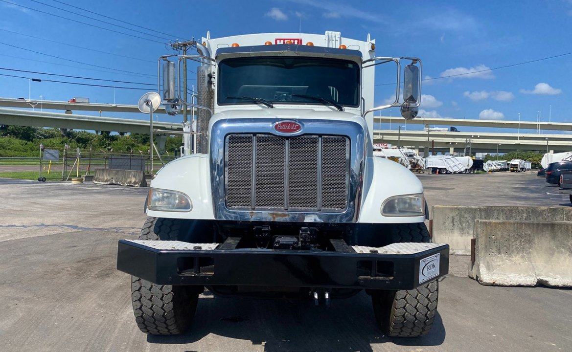 2016 Peterbilt 348 - 27 yard Heil Rear Loader Garbage Truck