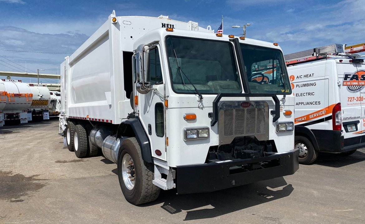 2017 Peterbilt 320 - 32 Yard heil Dura Pack 5000 Rear Loader Garbage Truck