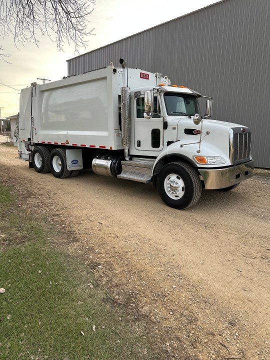 2020 PETERBILT 348 HEIL 5000 25 YD REAR LOADER $154,900